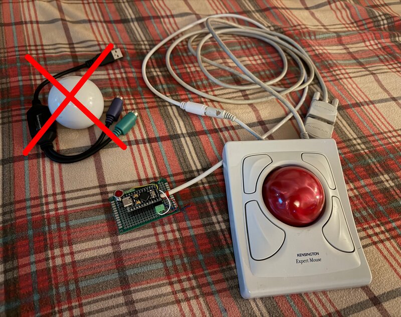 Full setup showing trackball, Pro Micro, and crossed-out USB-PS/2 adapter